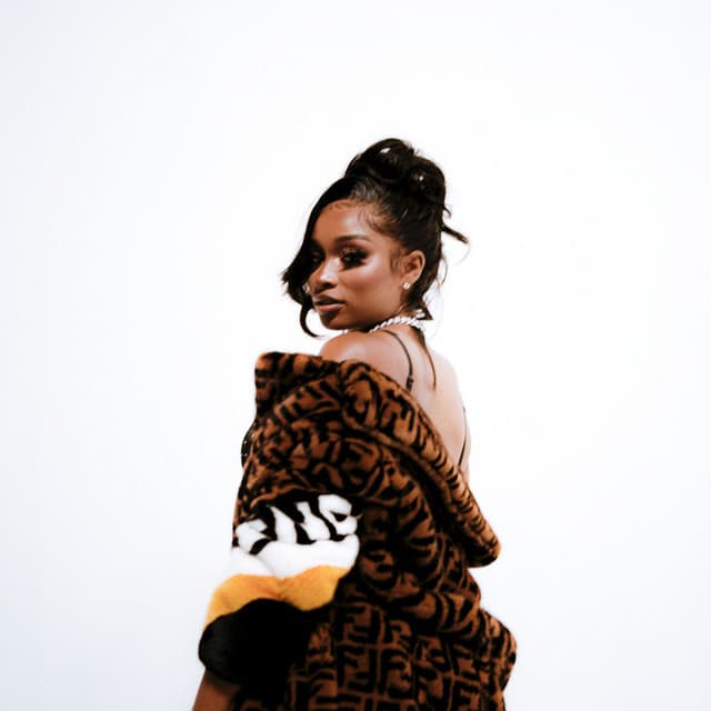 Armani Caesar artist profile image