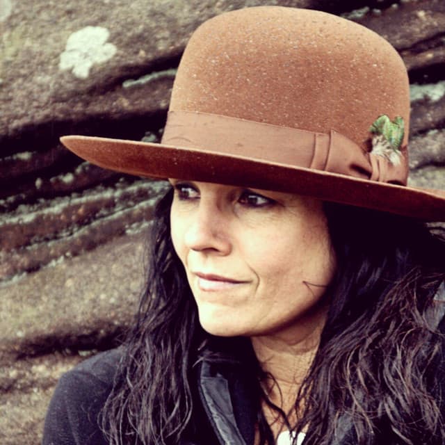 Corinne West profile