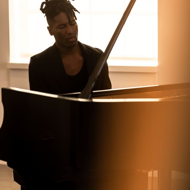 Jon Batiste's artist profile image
