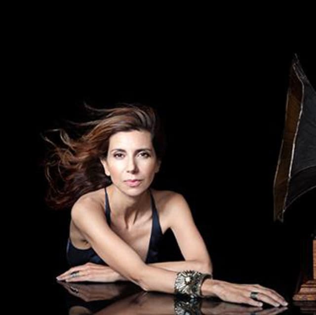 Magos Herrera artist profile image