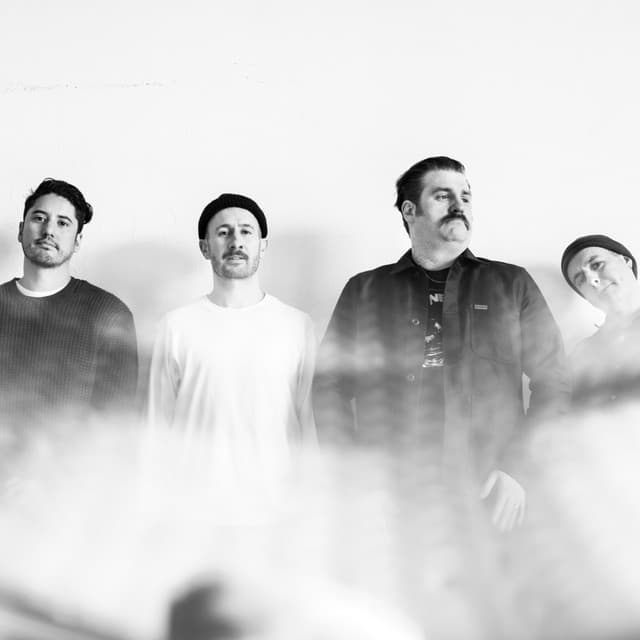 And So I Watch You from Afar's artist profile image
