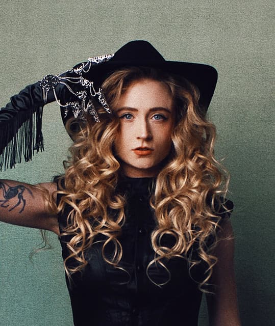 Janet Devlin artist profile image