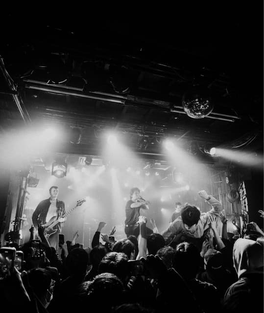 Holding Absence's artist profile image