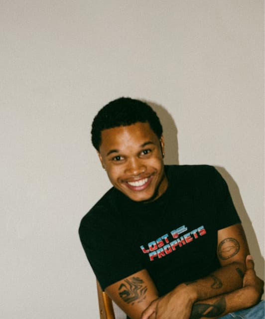 Q's artist profile image