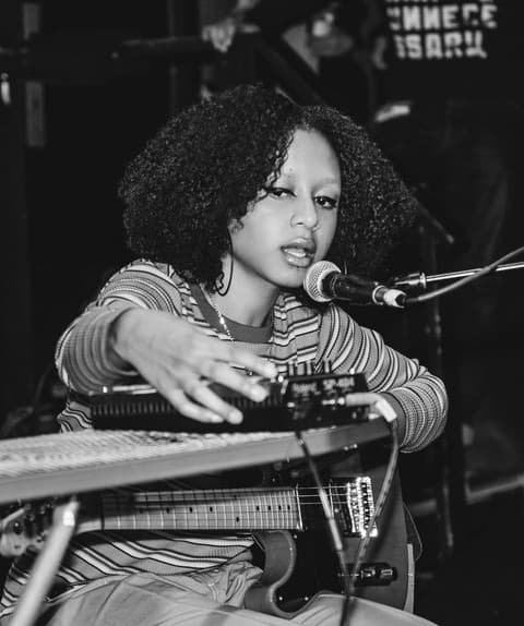 Anysia Kym artist profile image
