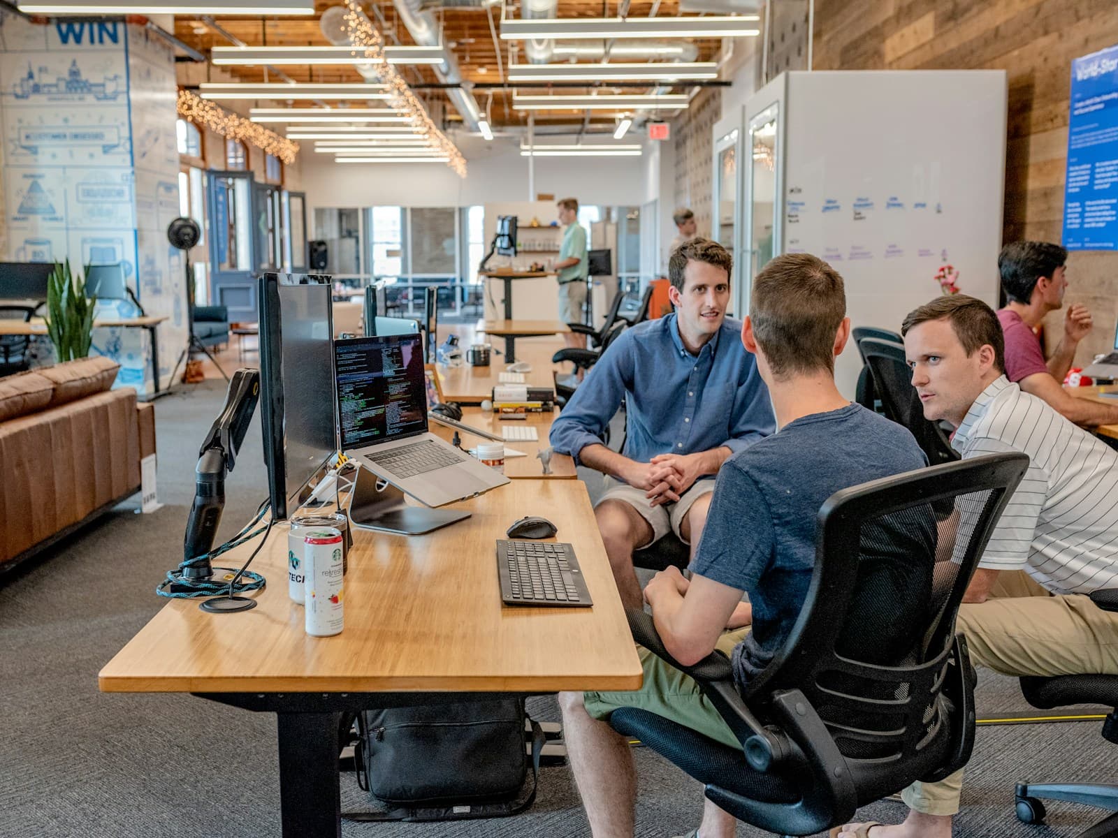 Team collaborating at a laptop